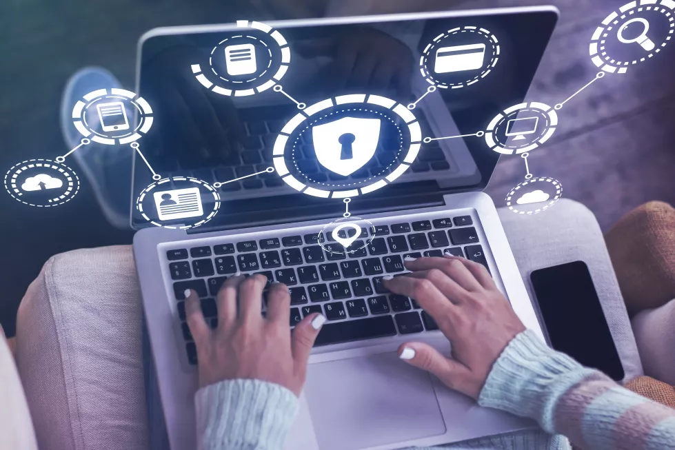 personal-data-security-concept-with-technological-symbols-digital-screen-woman-hands-laptop-keyboard