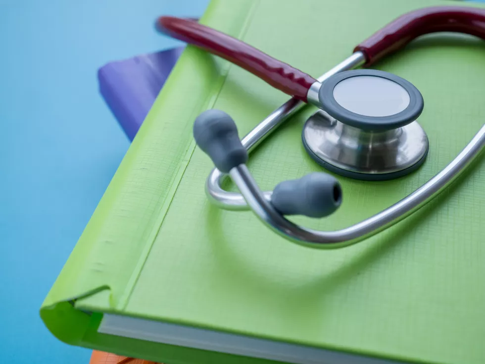 high-angle-view-stethoscope-file