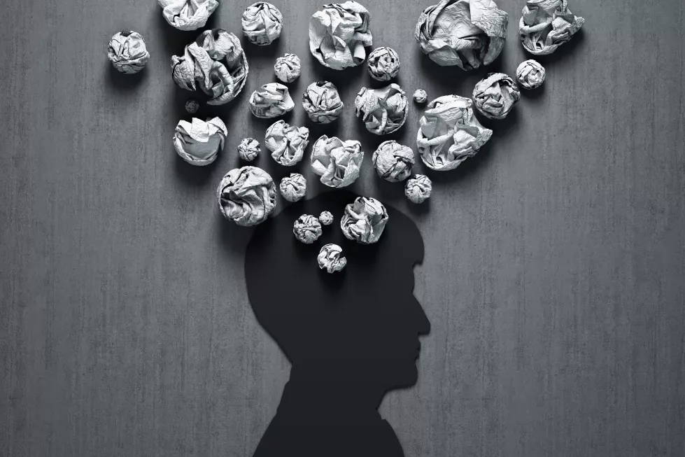 srumpled-paper-head-businessman-concrete-background