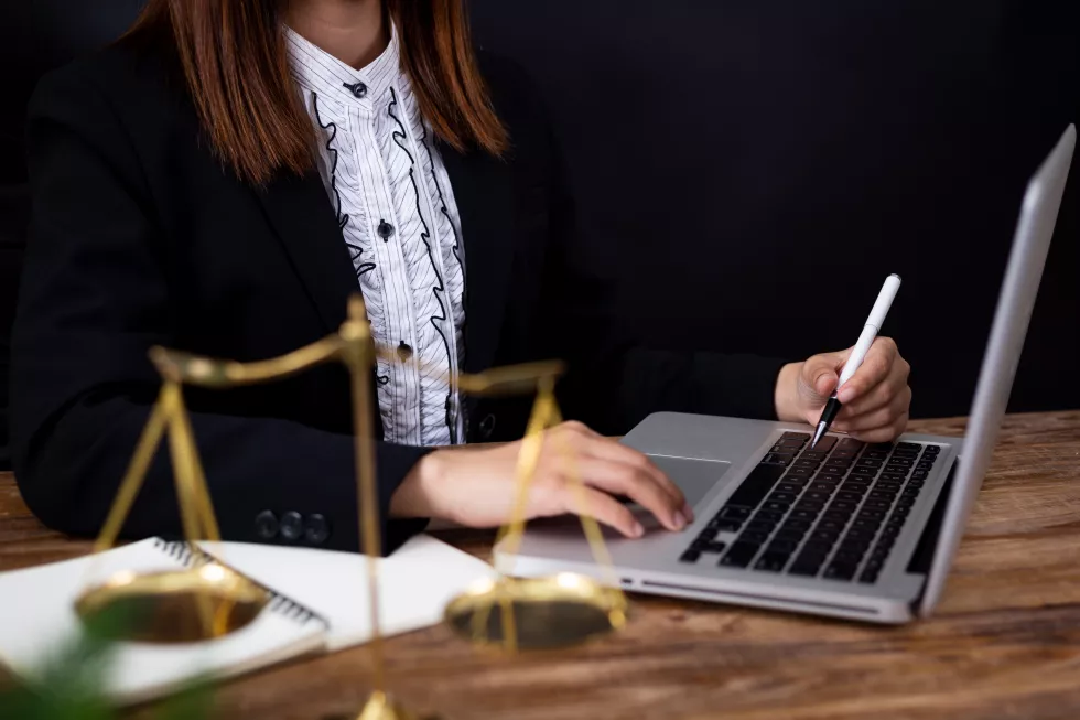 midsection-woman-using-laptop
