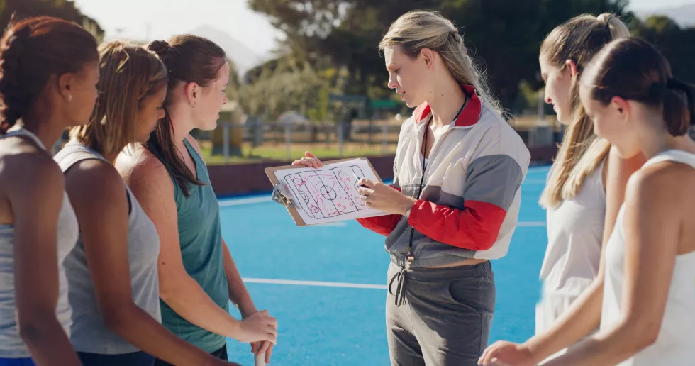 sports-women-team-with-coach-game-plan-conversation-training-competition-strategy-win-teamwork-girls-court-mentor-talking-planning-discussion-victory-wellness