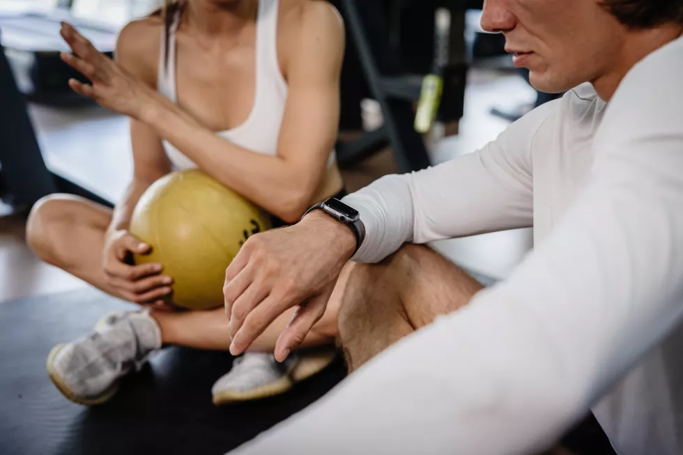 sport-man-looking-wrist-watch-smart-watch-health-fitness-tracker-hr-calorie-monitor-device-technology