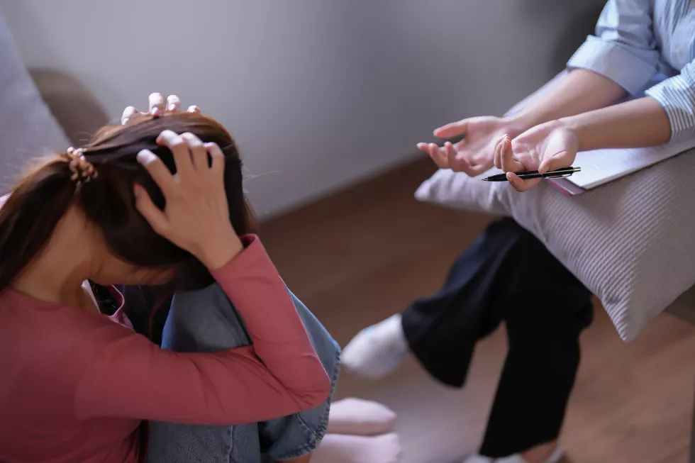 asian-psychologist-women-explaining-about-examining-healthcare-results-psychological-health-therapy-patient-home-while-female-patient-stressed-headache-with-anxiety-mental-health