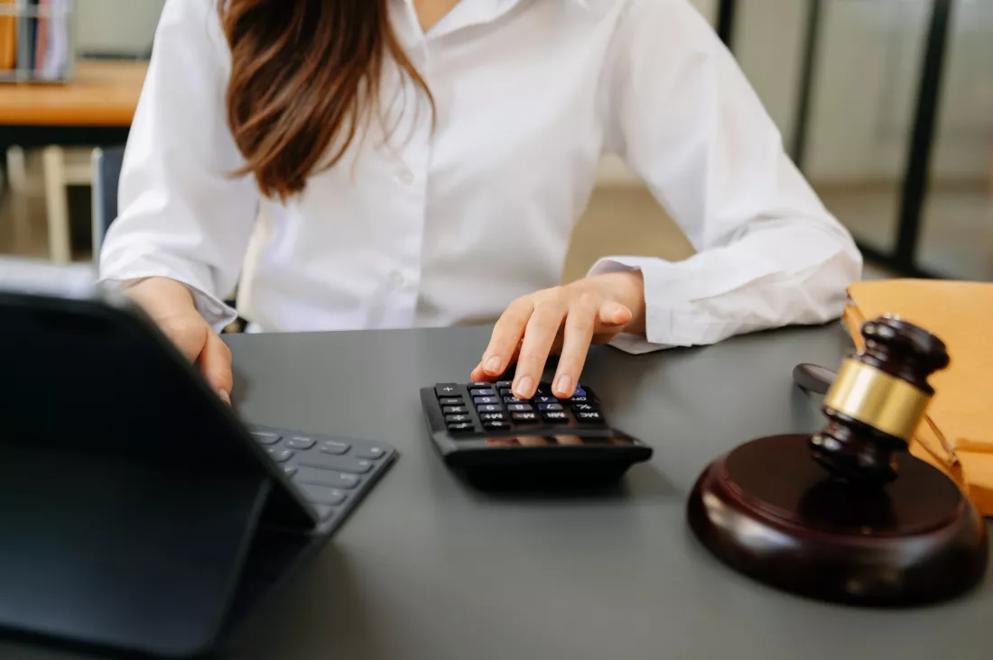 justice-law-conceptbusinessman-lawyer-accountant-working-accounts-using-smart-phone-laptop-digital-tablet-calculator-documents-dark