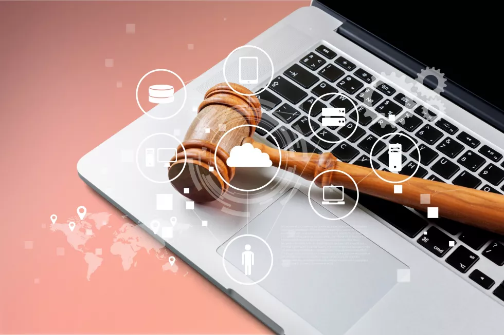 wooden-judge-gavel-laptop-keyboard