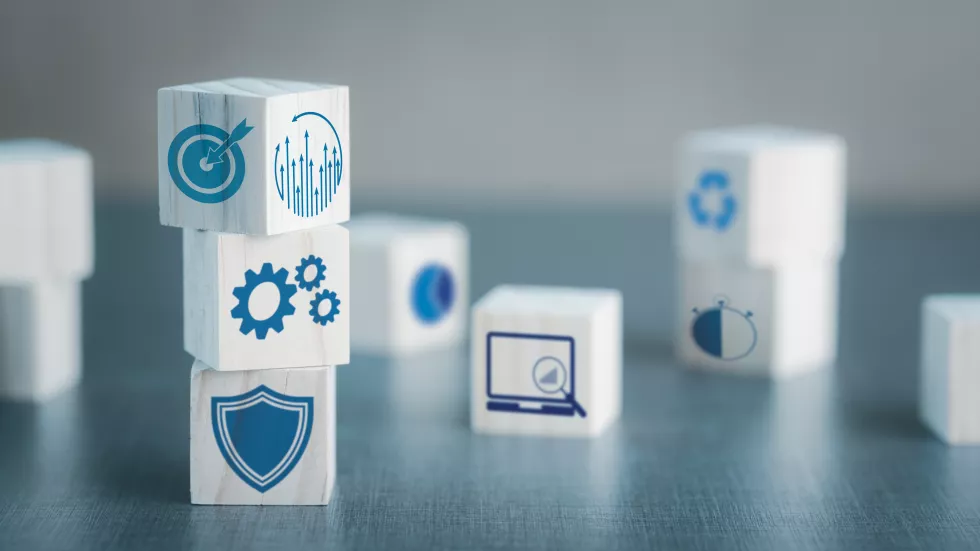 wooden-blocks-placed-workbench-artificial-intelligence-technology-symbol-icon
