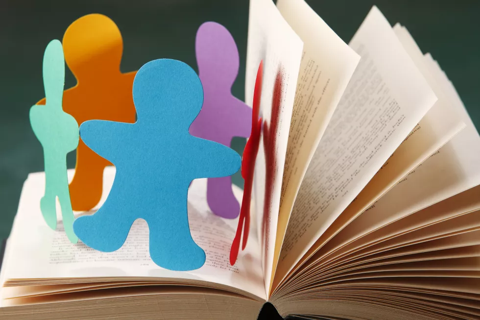 close-up-paper-team-open-book-table