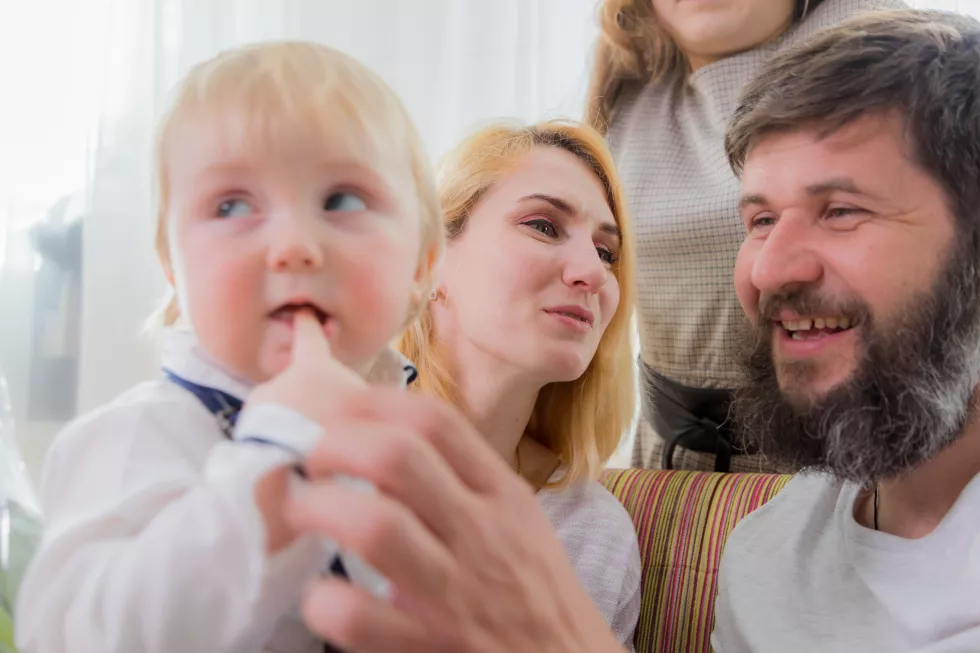 dad-with-children-congratulate-mom-holiday-mothers-day