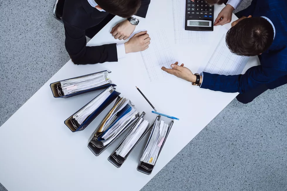 business-people-meeting-view-from-bookkeeper-financial-inspector-making-report-calculating-checking-balance-internal-revenue-service-checking-financial-document-audit-tax-conce