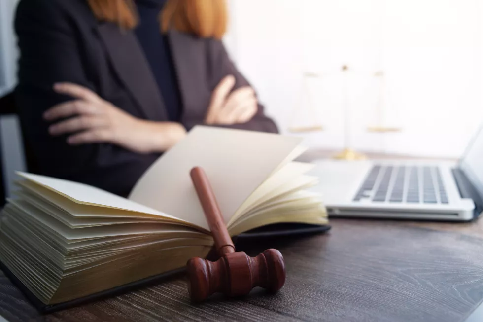 justice-law-conceptmale-judge-courtroom-wooden-table-counselor-male-lawyer-working-office-legal-law-advice-justice-concept