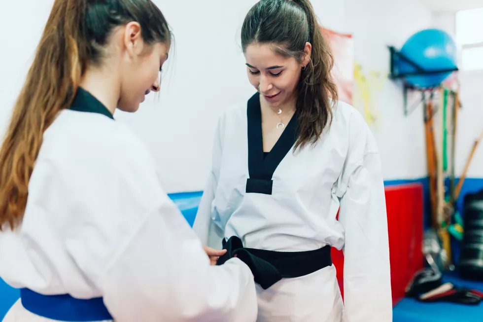 young-women-wearing-belt-taekwondo-practice