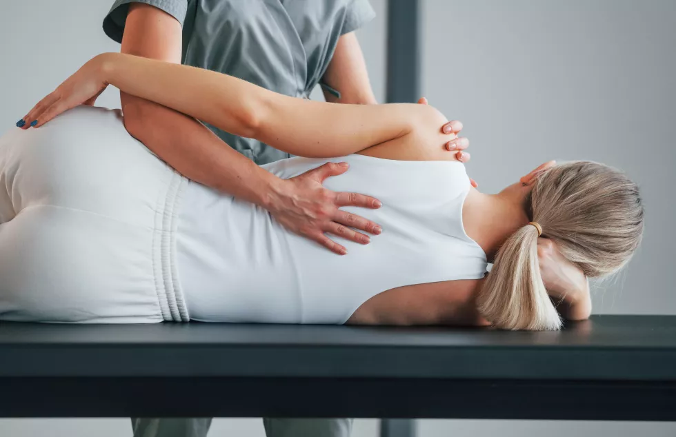 active-exercises-woman-is-health-center-getting-help-by-doctor