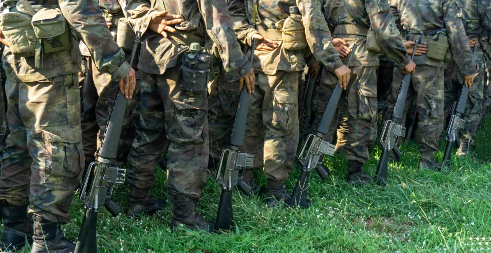 group-people-grassy-field