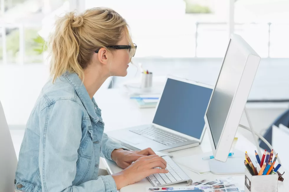 blonde-designer-working-her-desk