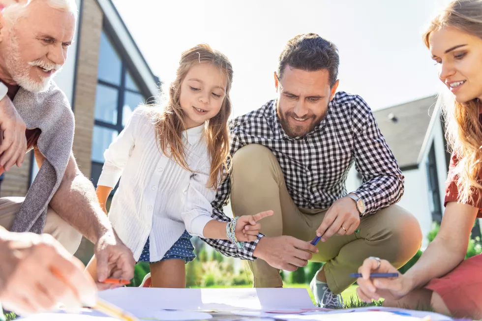 wait-second-charming-little-girl-keeping-smile-her-face-while-sitting-near-her-daddy