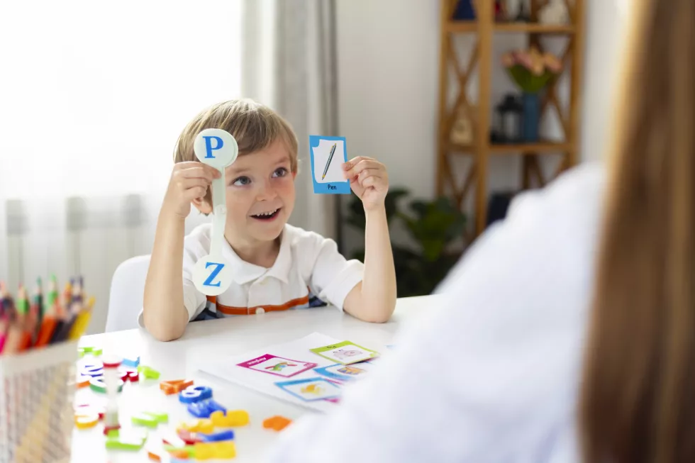 boy-learning-letters-classroom-setting