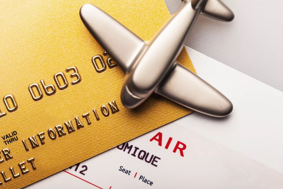 credit-card-banking-finance-shopping-close-up-gold-card-airline-ticket