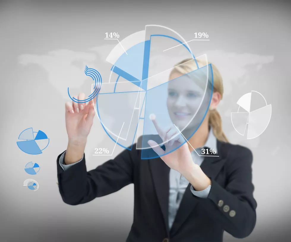 businesswoman-working-with-graphs-against-background