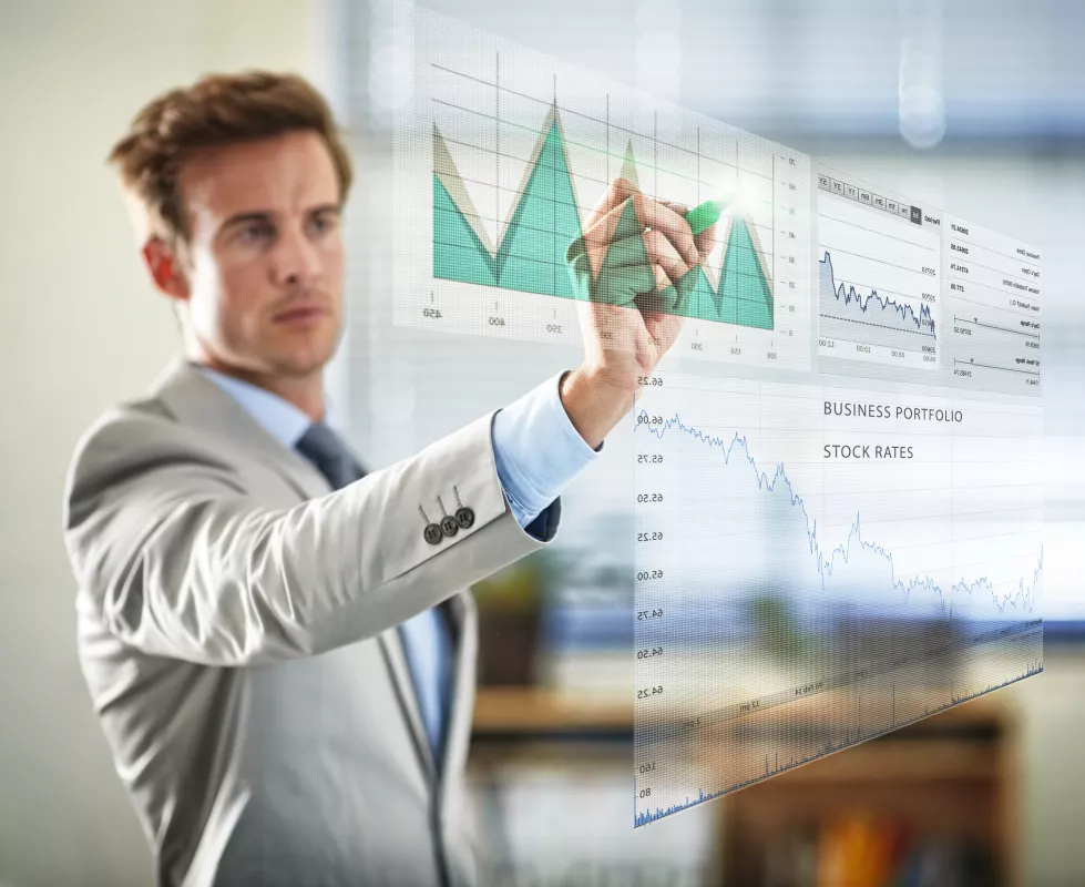 digital-corporate-analysis-cropped-shot-handsome-young-businessman-plotting-graphs-using-digital-interface