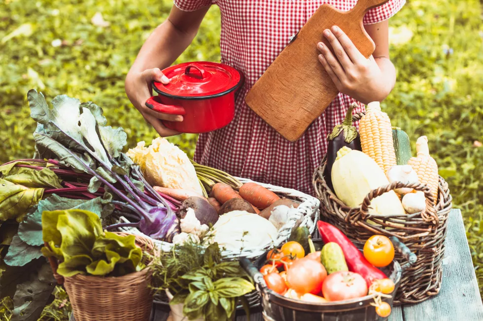 midsection-man-holding-vegetables-basket