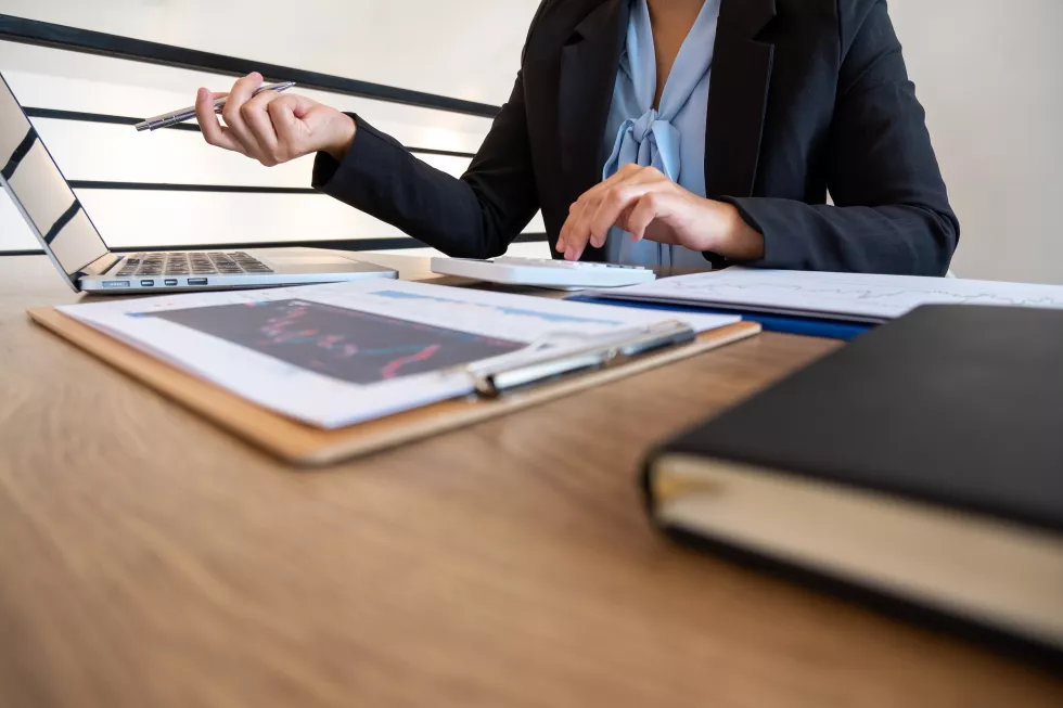 low-angle-view-man-using-laptop-table