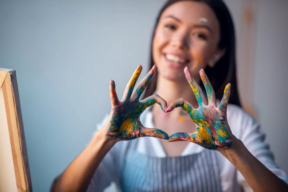 woman-smiling-while-enjoying-her-occupation