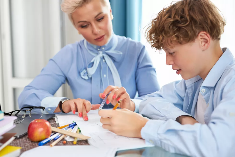 good-looking-teacher-pupil-having-lesson