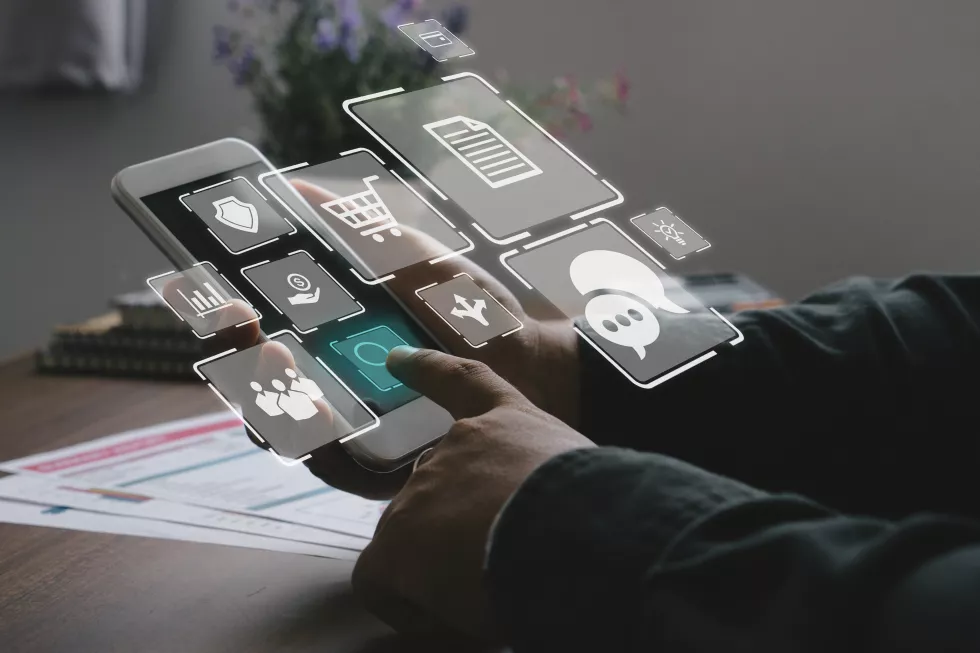 digital-marketing-conceptbusinessman-hand-working-with-smart-phone-with-virtual-icon-diagram