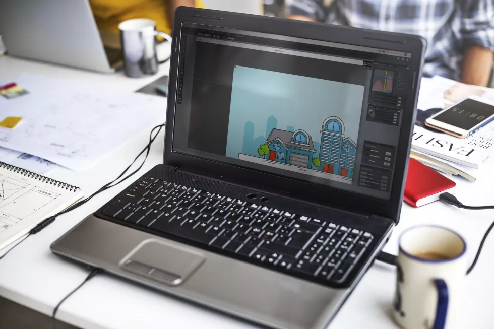 laptop-screen-showing-graphic-house-exterior-design-desktop