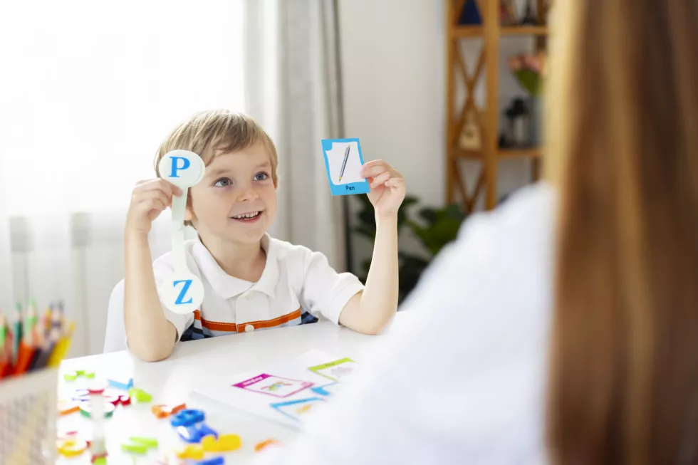 boy-happy-learning-alphabet-with-flashcards