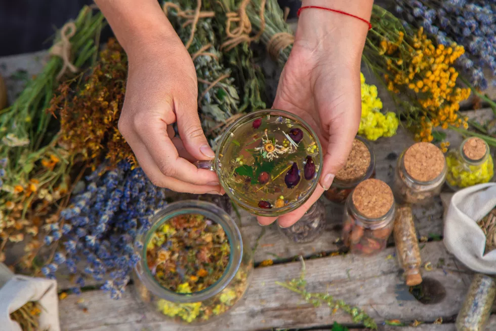 woman-brews-herbal-tea-selective-focus