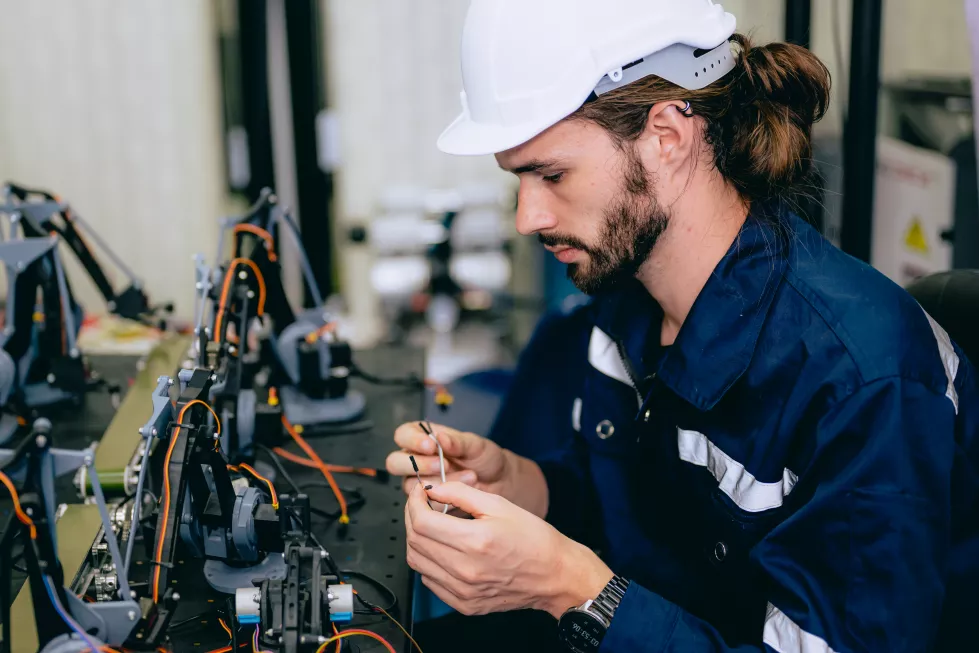 professional-technician-checking-repairing-part-automatic-machine