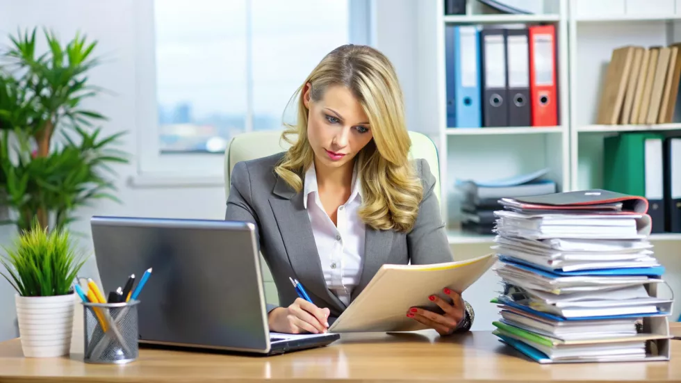 woman-is-writing-notebook-with-pen-her-hand