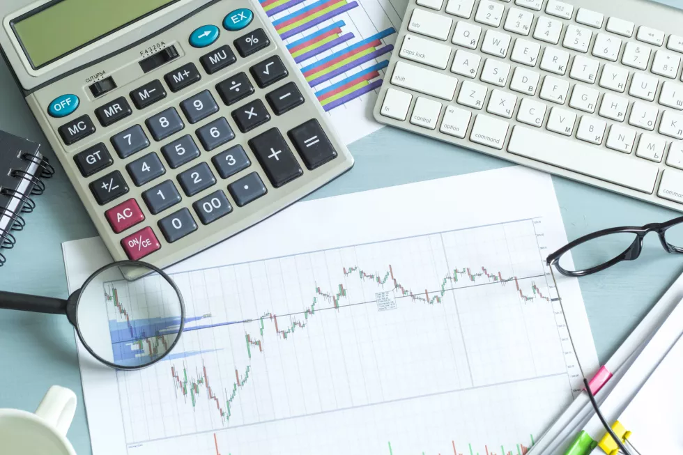 workspace-calculator-chart-glasses-keyboard-concept-financial-report-accounting