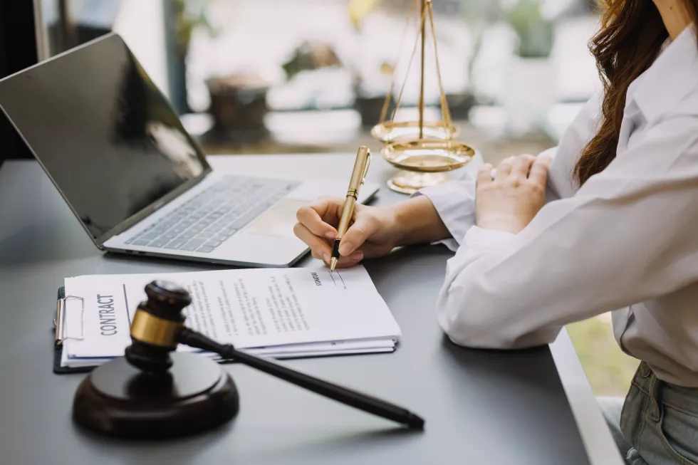 male-lawyer-working-with-contract-papers-wooden-gavel-tabel-courtroom-justice-law-attorney-court-judge-concept-4