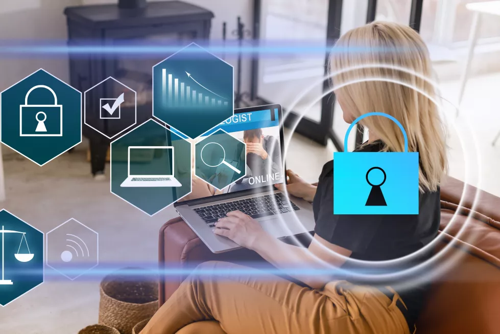 businesswoman-with-laptop-desktop-office-interior-blue-glowing-information-protection-icons-padlock-business-data-symbols-concept-cyber-security-data-storage