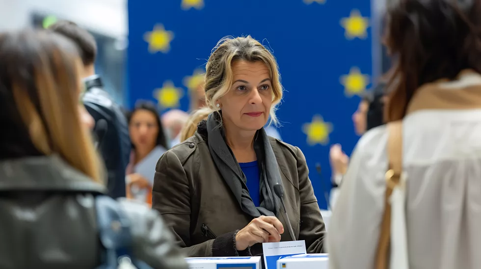 woman-is-talking-man-front-poster-that-says-word-it