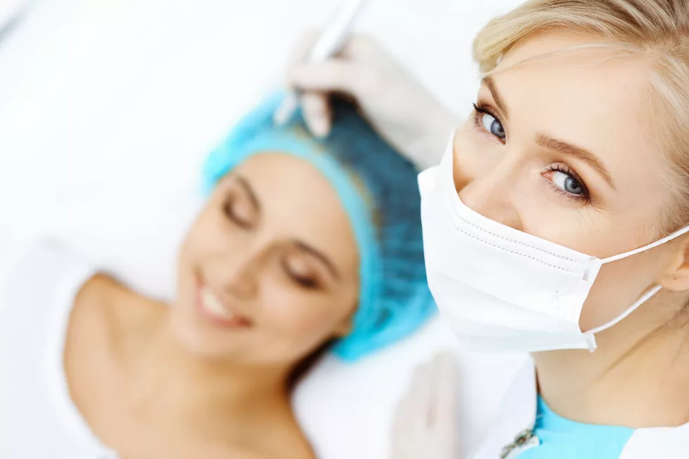 professional-beautician-doing-eyebrow-tattoo-woman-face-permanent-brow-makeup-beauty-salon-closeup-cosmetology-treatment