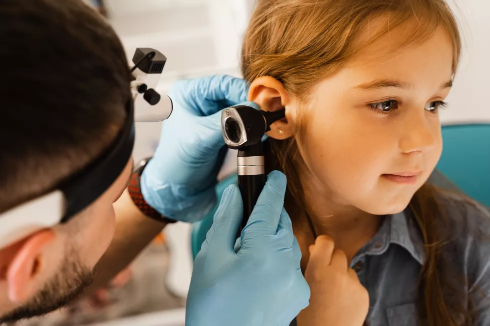ent-doctor-otolaryngologist-looks-through-otoscope-ears-little-girl-otoscopy-treatment-child-ear-pain