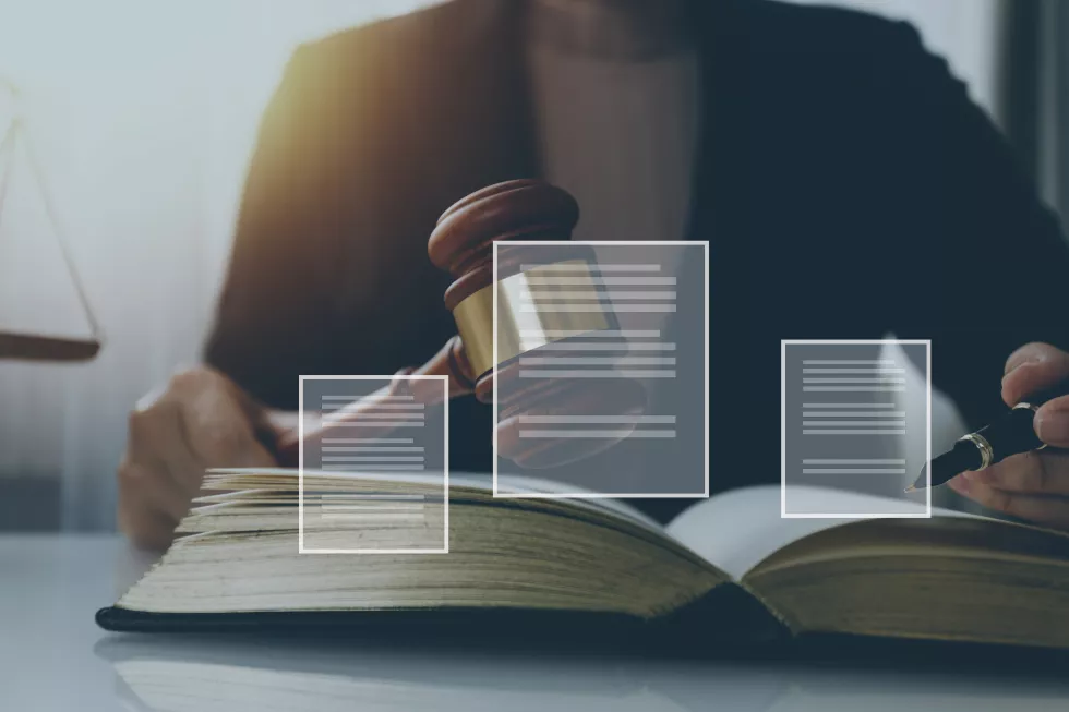 business-lawyers-discussing-contract-papers-with-brass-scale-desk-office-law-legal-services-advice-justice-law-concept