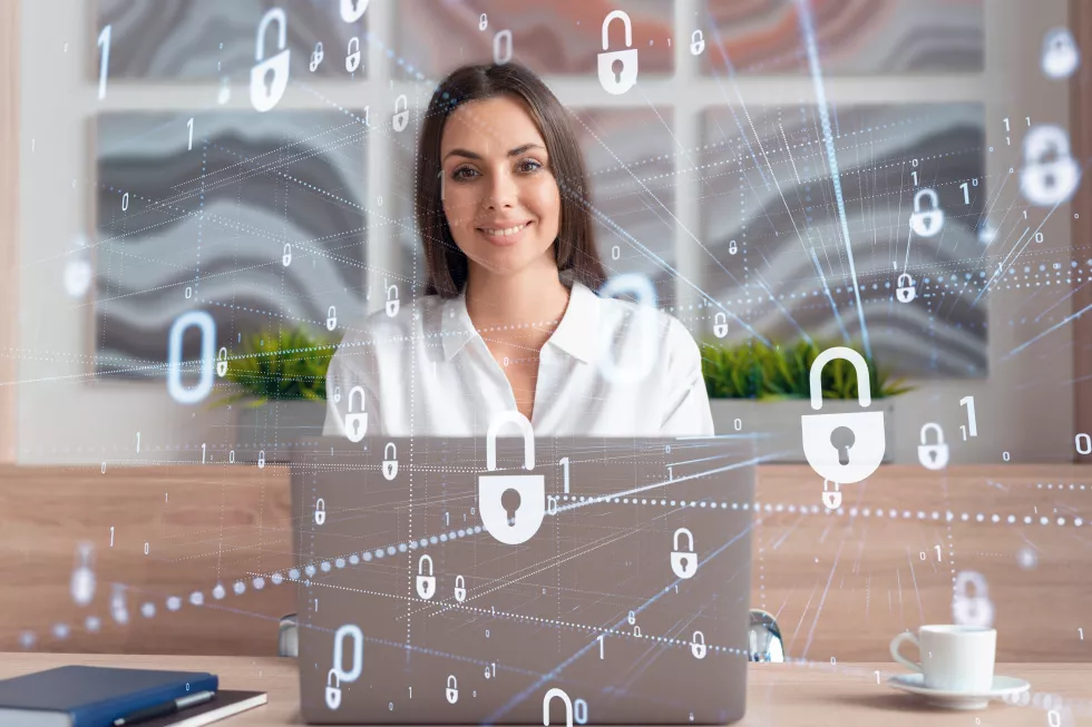 attractive-businesswoman-white-shirt-workplace-working-with-laptop-defend-customer-cyber-security-concept-clients-information-protection-padlock-hologram-office-background