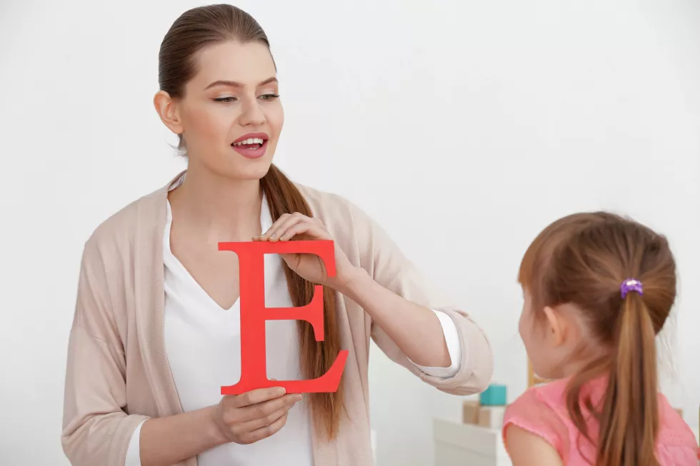 cute-little-girl-speech-therapist-office