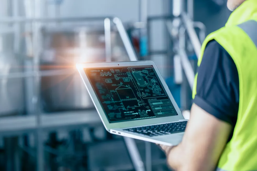 engineer-with-laptop-high-technology-software-industrial-factory-automation-operate-control-service-machine-working-monitor