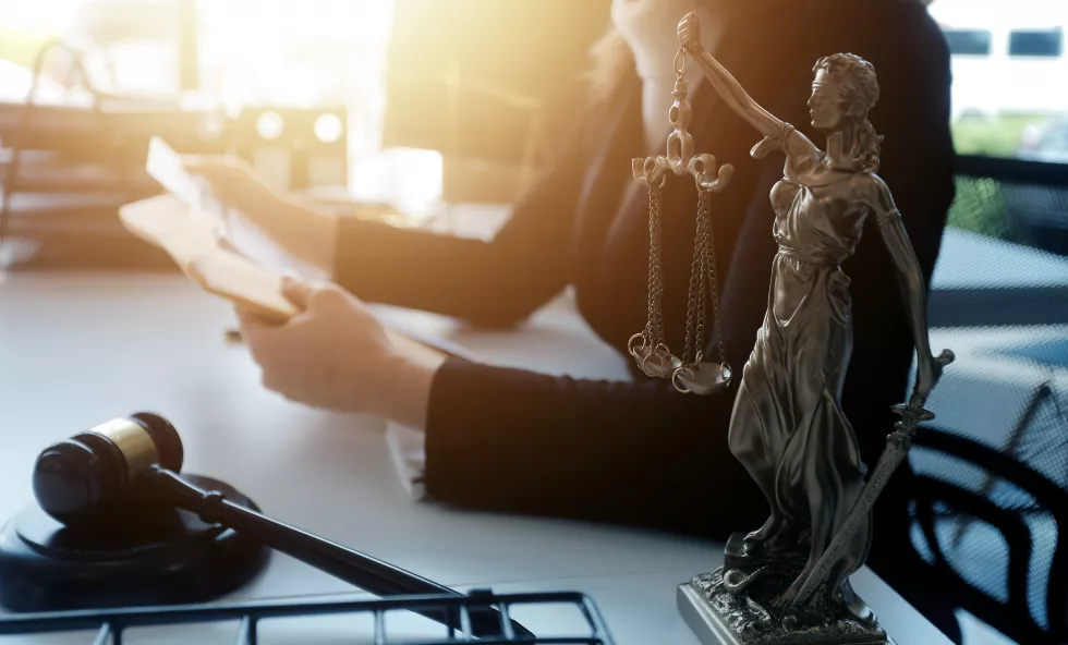 male-lawyer-working-with-contract-papers-wooden-gavel-tabel-courtroom-justice-law-attorney-court-judge-concept-2