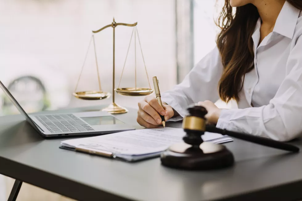 male-lawyer-working-with-contract-papers-wooden-gavel-tabel-courtroom-justice-law-attorney-court-judge-concept-3