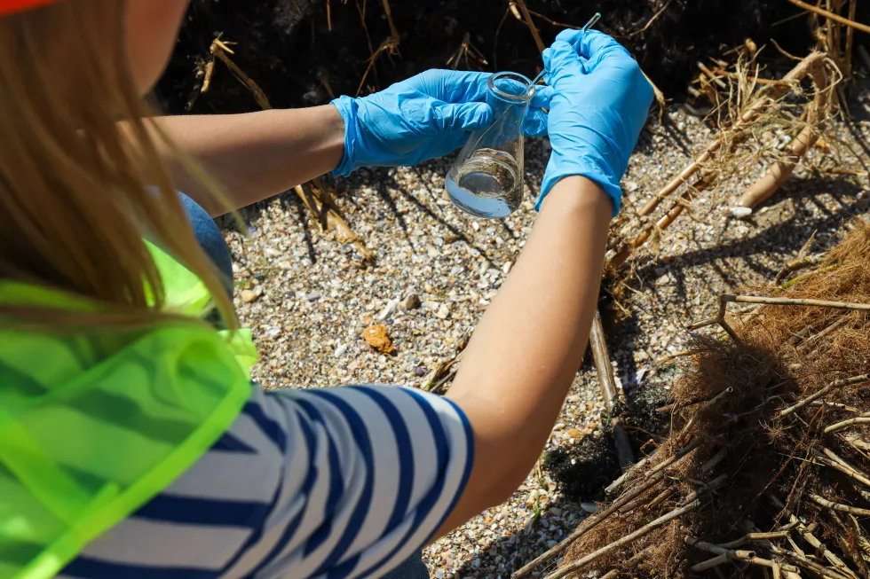 people-clean-up-garbage-banks-river-environmental-protection