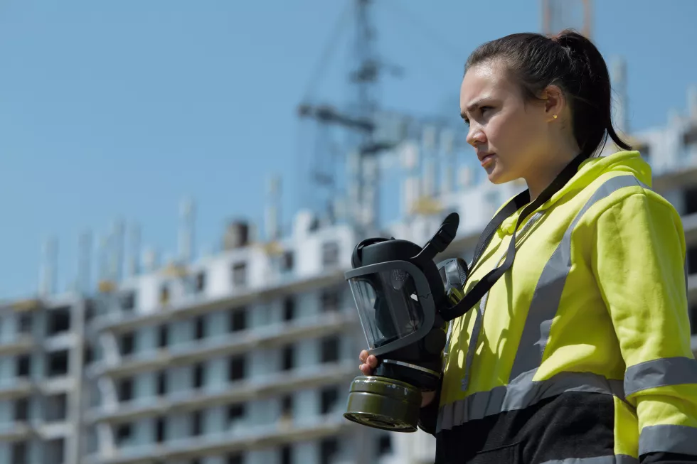 girl-inspector-environmental-disaster-looks-around-with-gas-mask-her-hand