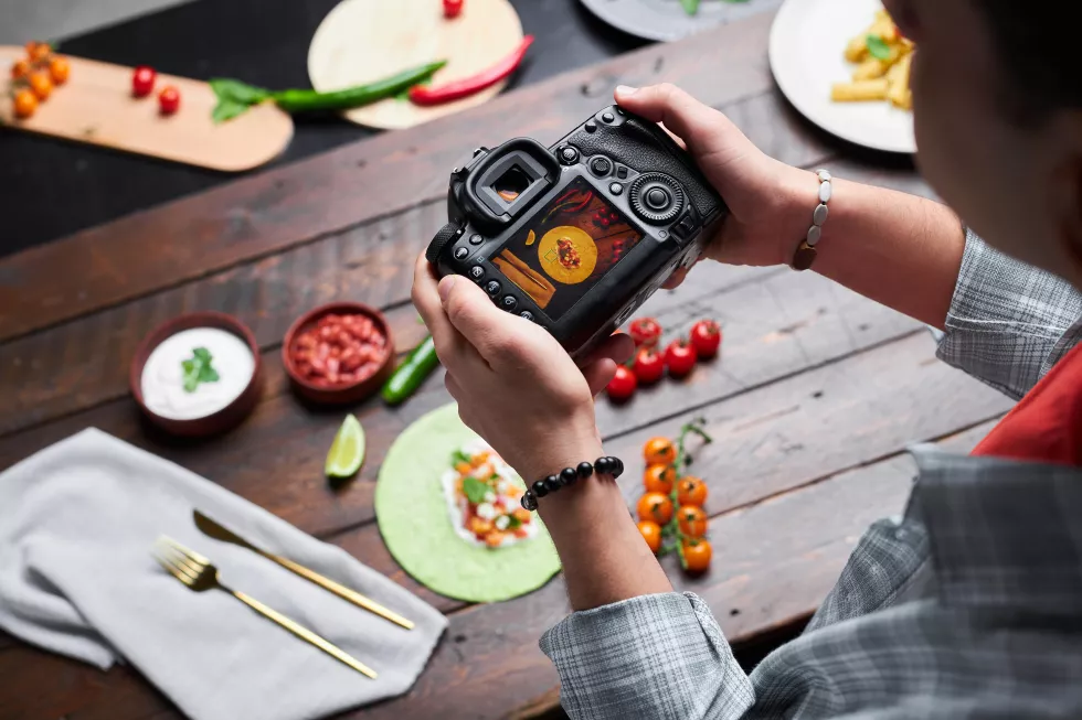 man-making-photo-food-camera