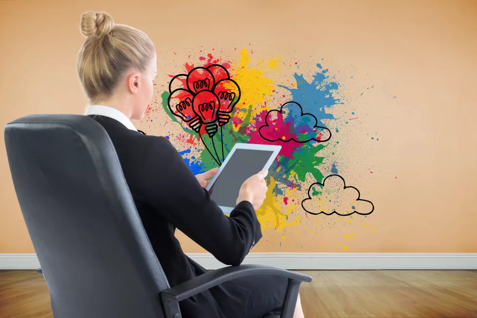 composite-image-blonde-businesswoman-sitting-swivel-chair-with-tablet