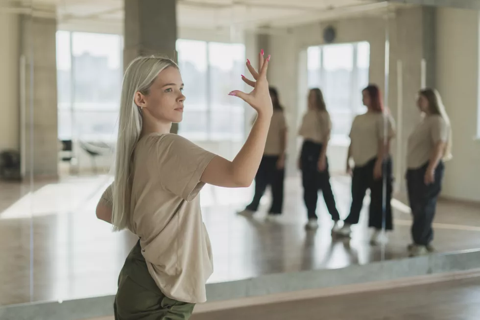 young-female-doing-hiphop-dance-moves-dance-studio